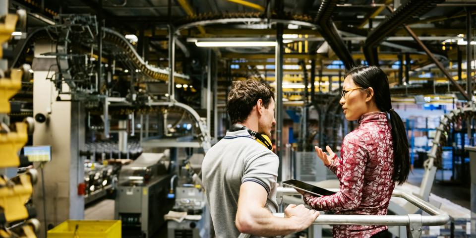 Male and Female in an engineering factory